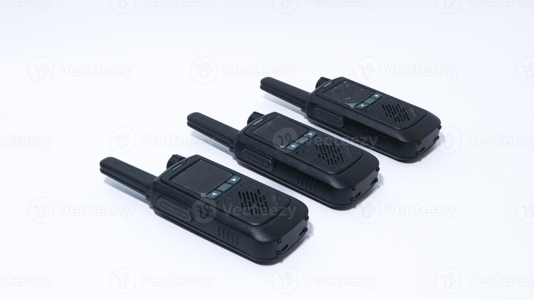 Black portable radio ht or walkie talkie in a white background photo