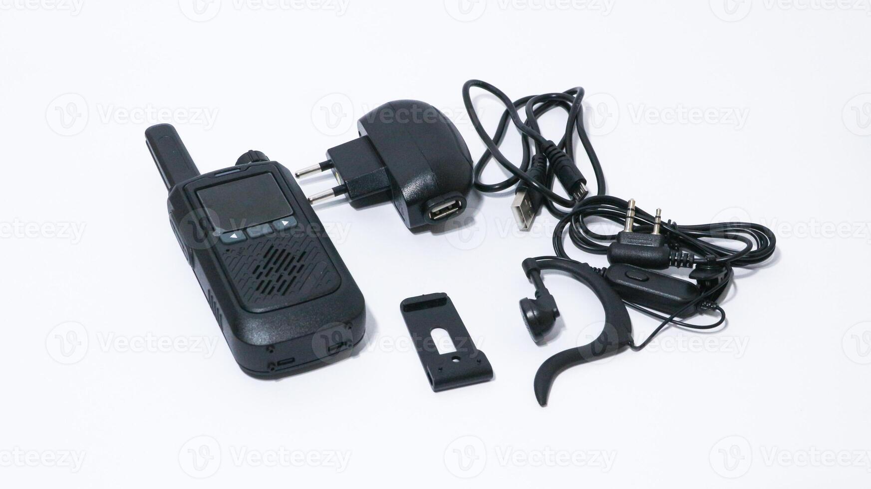 Black portable radio ht or walkie talkie in a white background photo