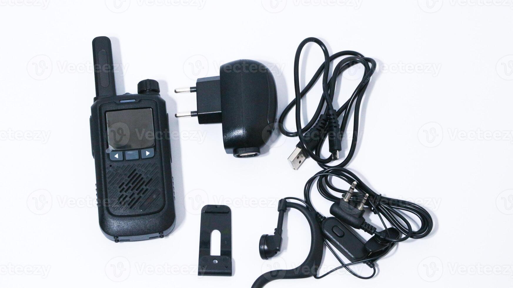 Black portable radio ht or walkie talkie in a white background photo