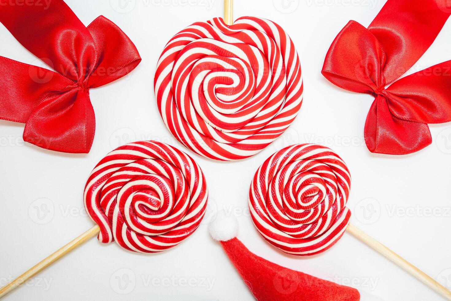 Flatlay of some red Christmas decoration, on a white background. Background for Christmas. photo