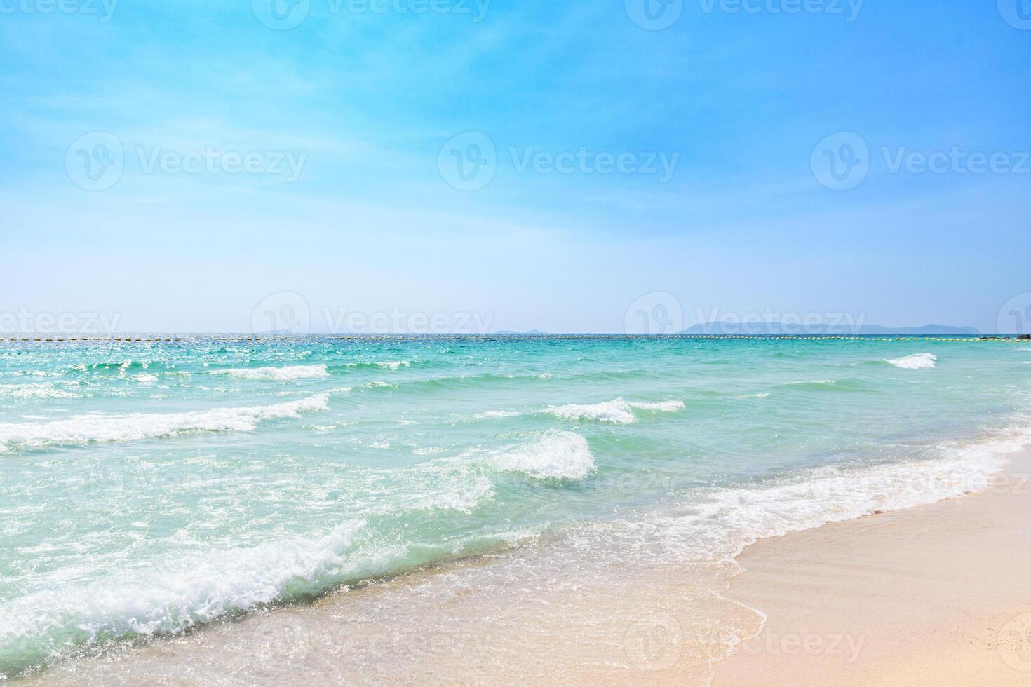 Landscape of tropical beach and clear blue sea on clear blue sky and island background morning day at Koh Larn island. Panorama ocean. Pattaya, Thailand. Wave, Seascape, Vacation, Holiday, No people. photo