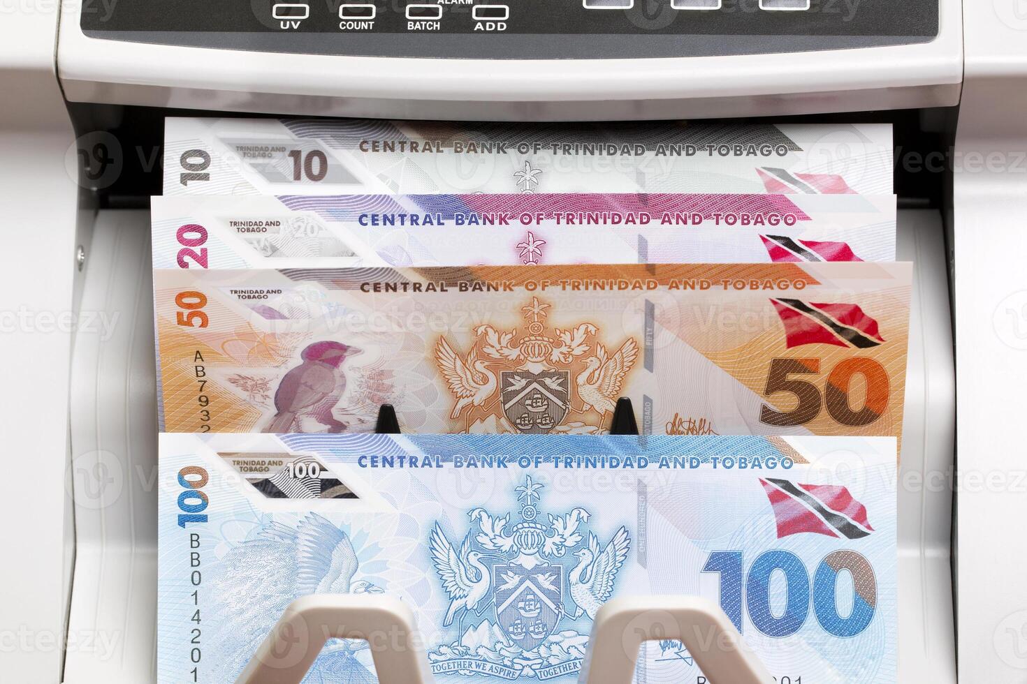 Trinidad and Tobago dollar in the counting machine photo