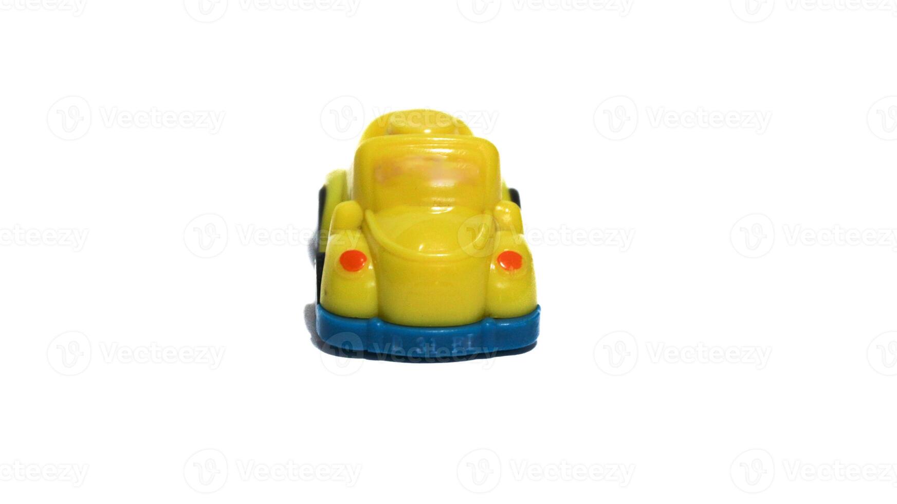 Plastic children's toys on a white background. small white car. Plastic children's toys. Children's toy. photo