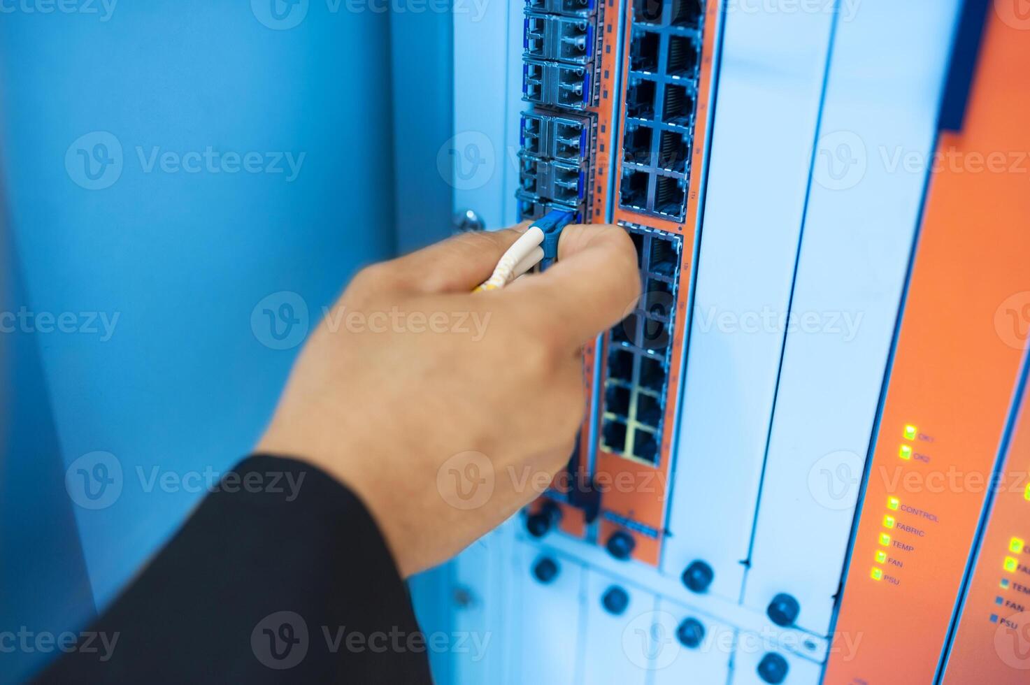 Fix network switch in data center room photo