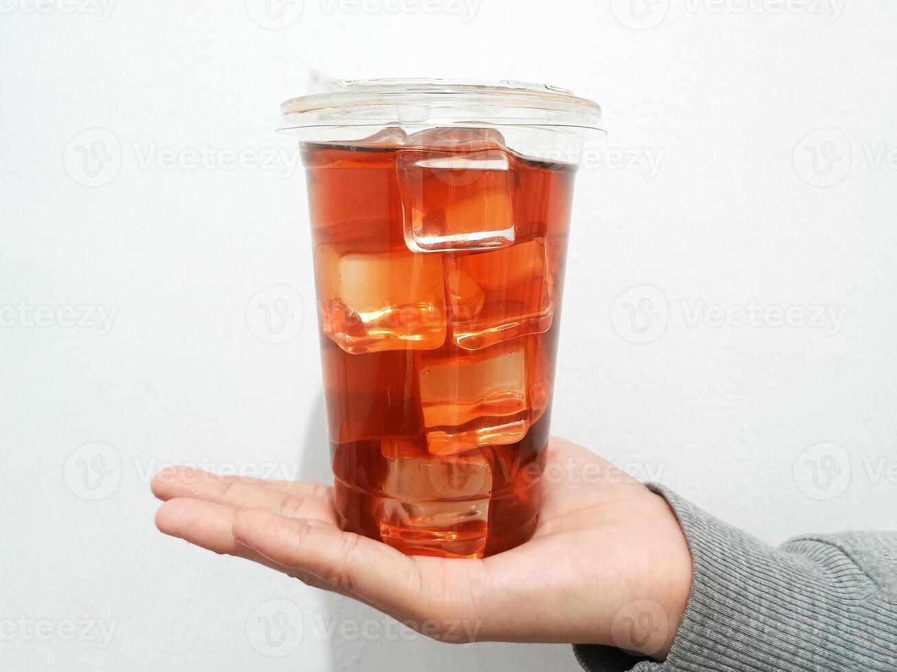 Coffee cup in hand front view photo