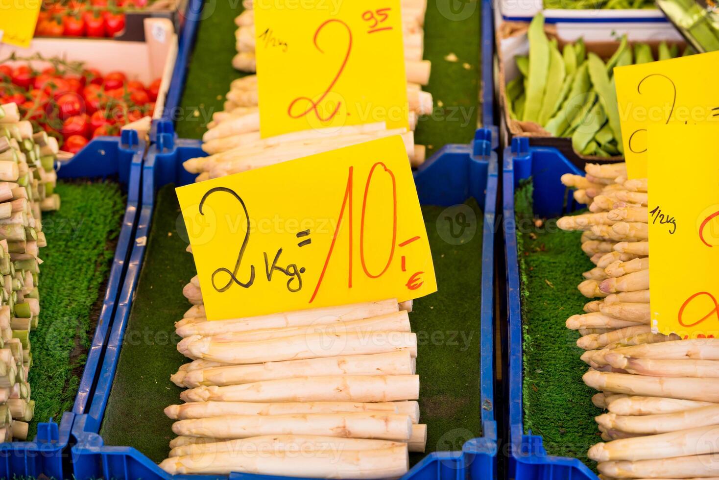 Fresh asparagus selling in a farmers market photo