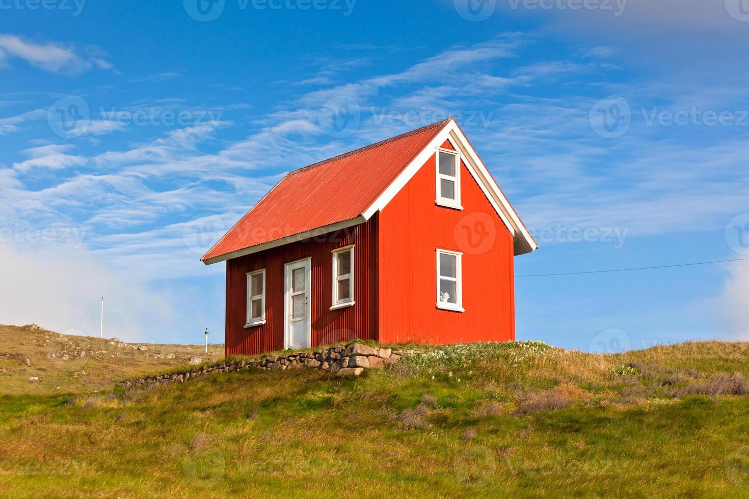 Bright Red Siding House in Iceland photo