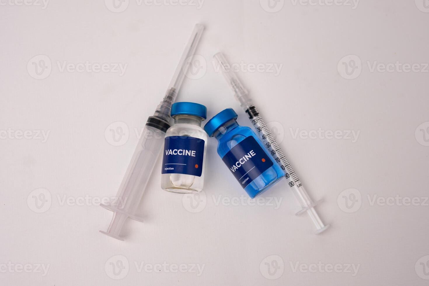 top view of vaccines and syringes on the table inside the clinic room. health and medical concepts photo