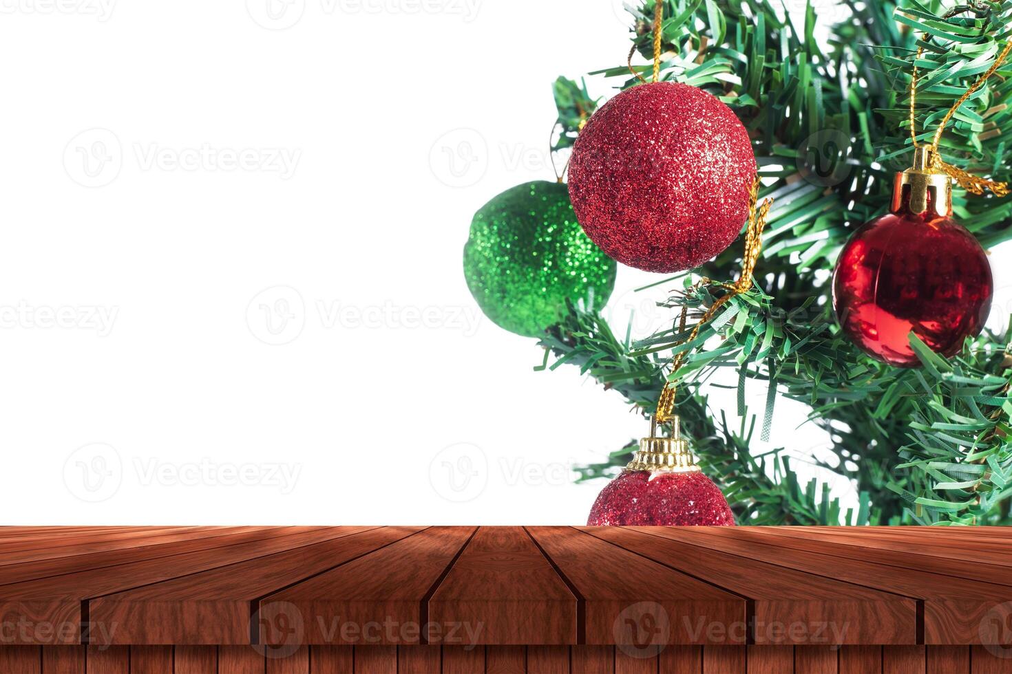 Christmas tree and wooden table with space for text photo