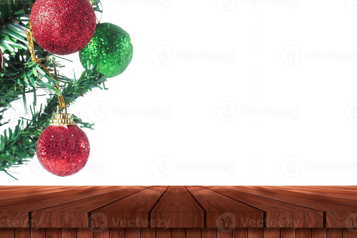 Christmas tree and decorations on wooden table photo