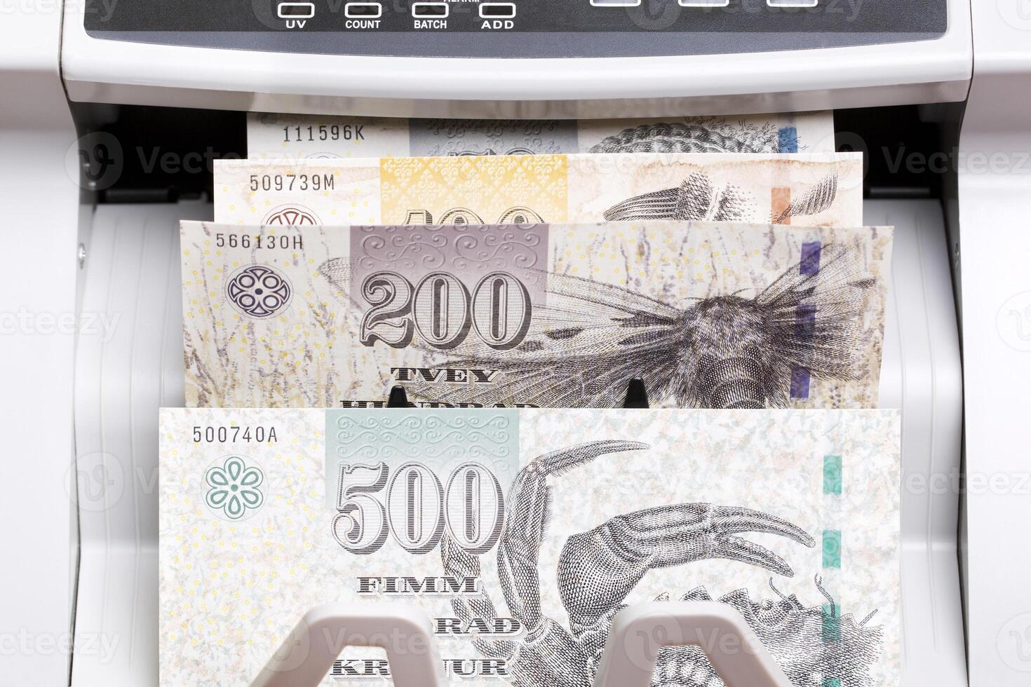 Faroese crown in the counting machine photo