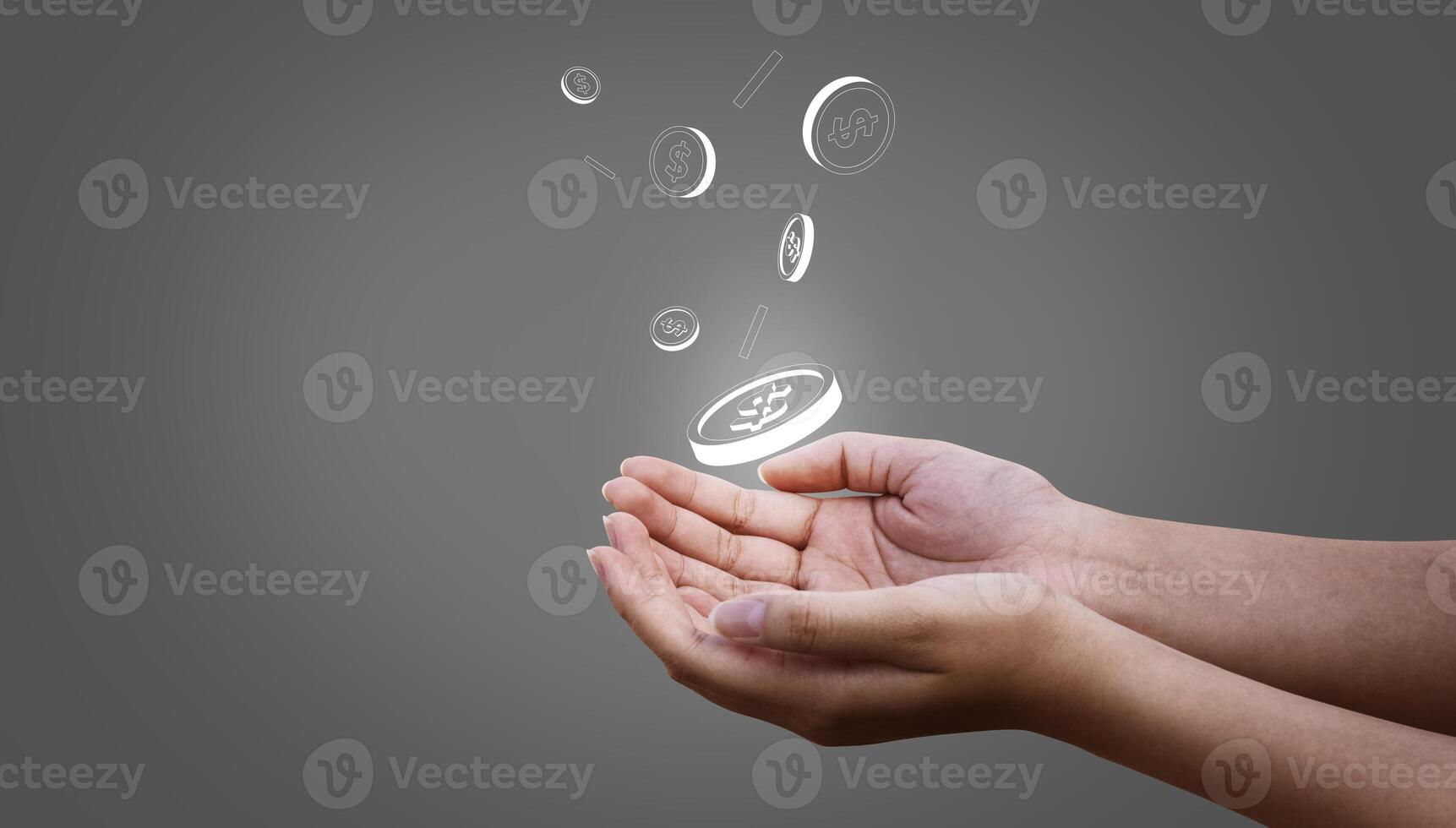 Person catching money, coins that fall down into hand on grey background photo