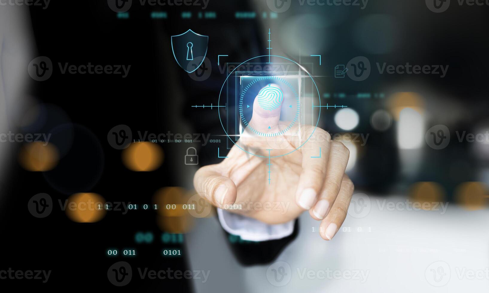 a person in a suit pressing a finger on a touch screen photo