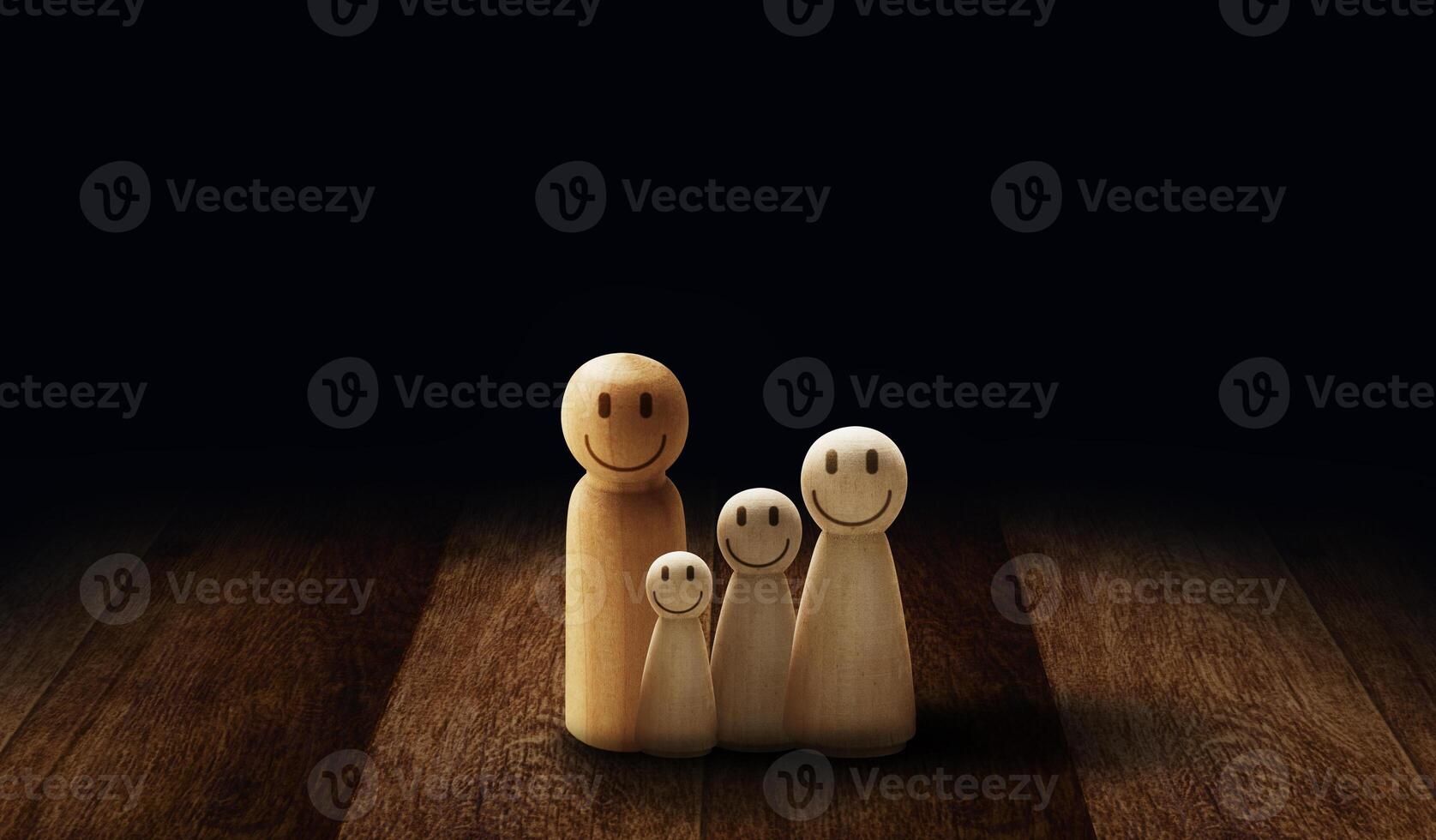 Wooden doll figures isolated on table. Insurance coverage concept photo