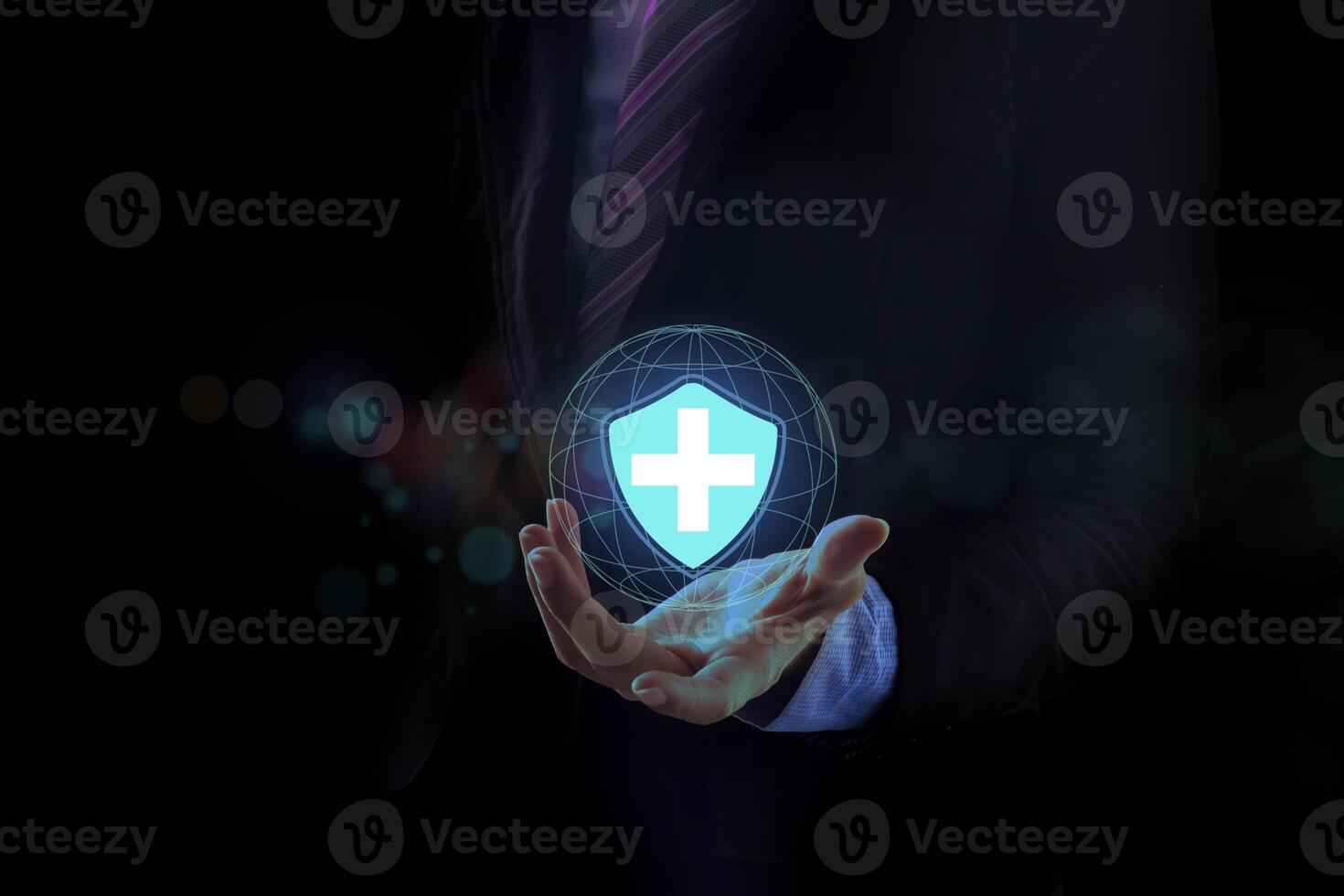 Businessman hand holding virtual medical health care icons with medical network connection. photo