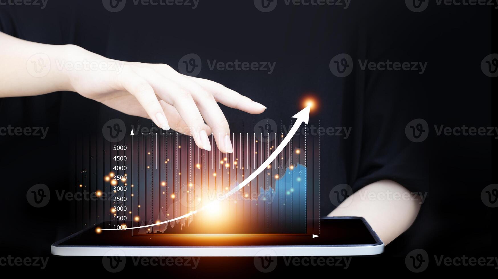 businesswoman hand holding tablet with graph on it photo