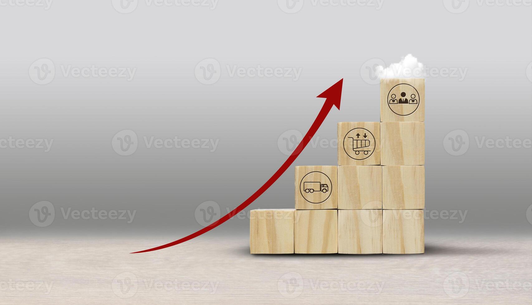 a wooden block with a red arrow pointing up photo
