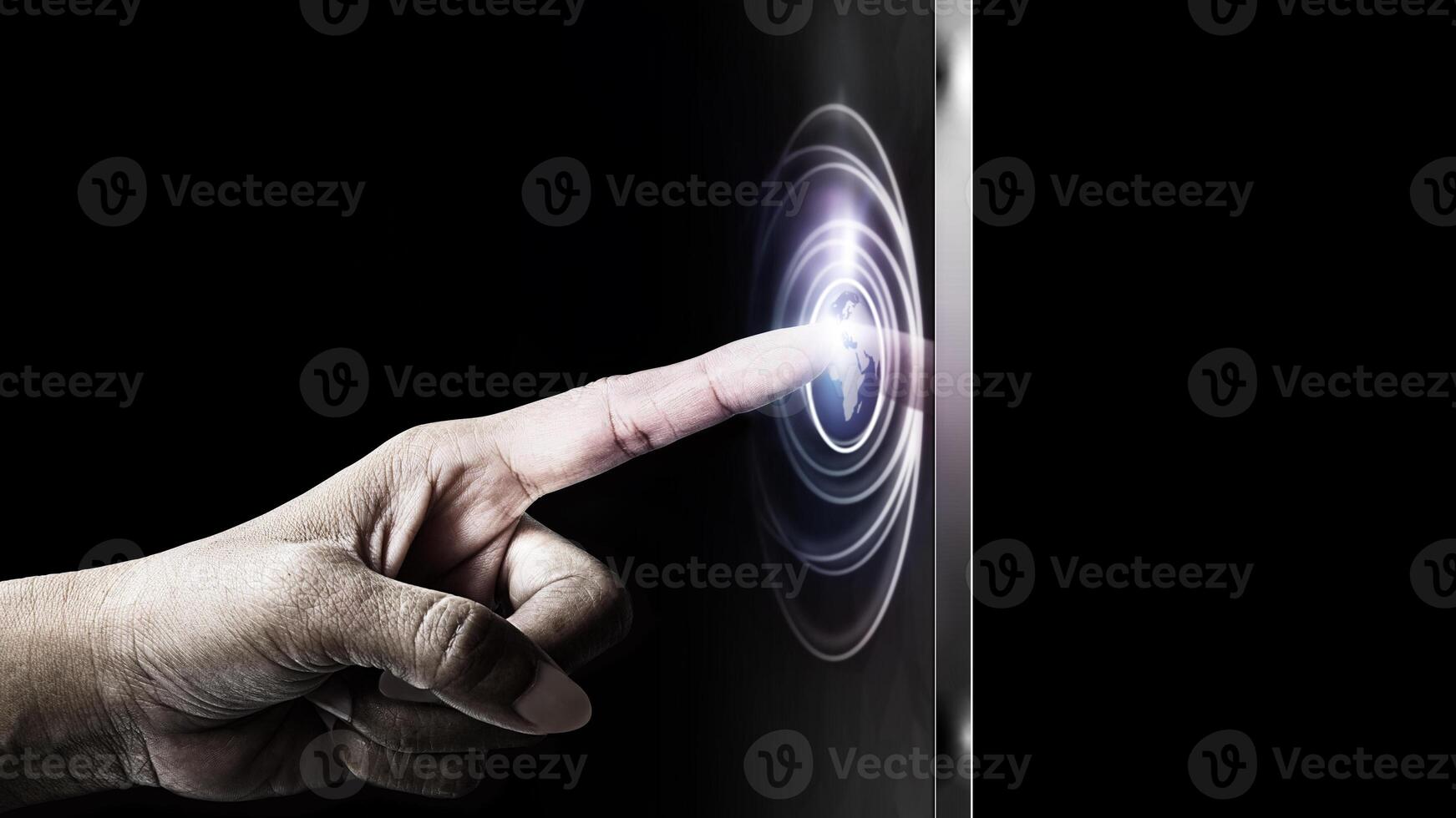 a person touching a button on a touch screen photo