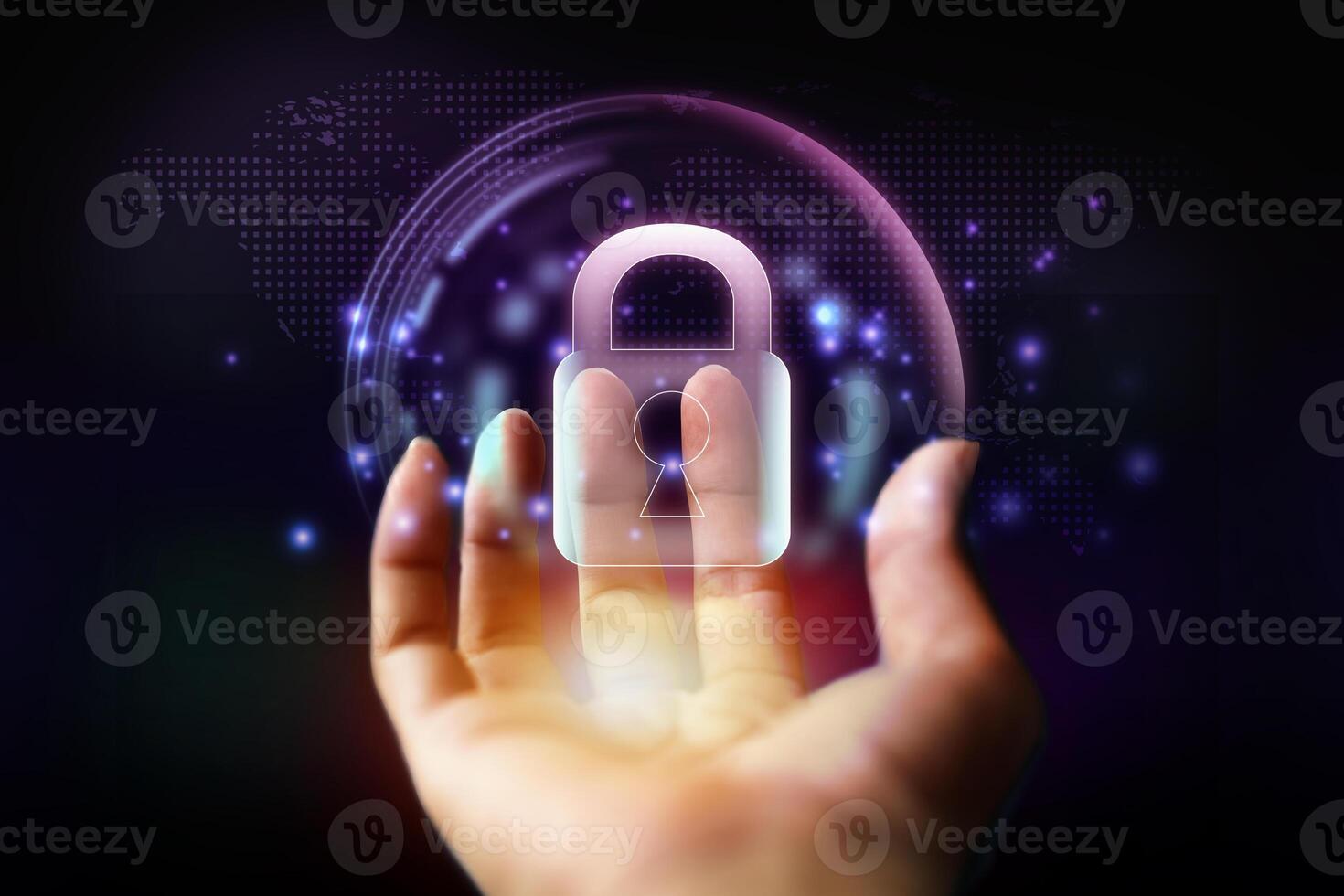 a hand holding a padlock with a world map on it photo
