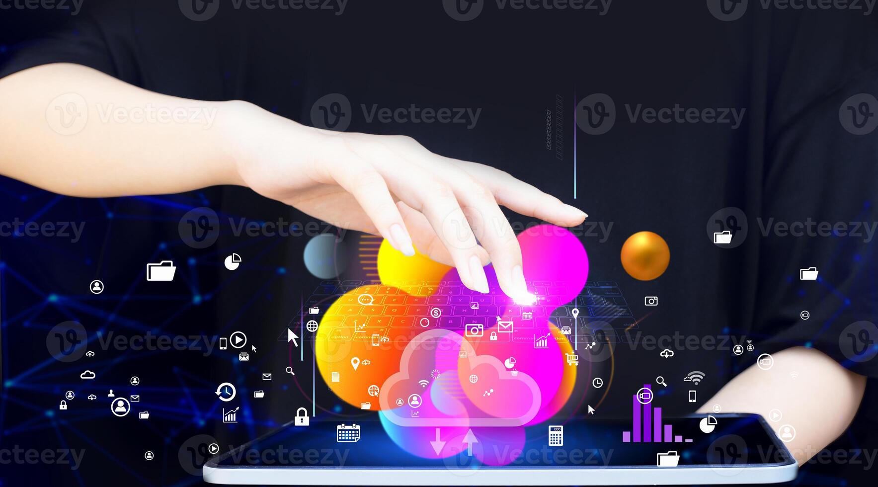 a person holding a tablet with colorful icons on it photo