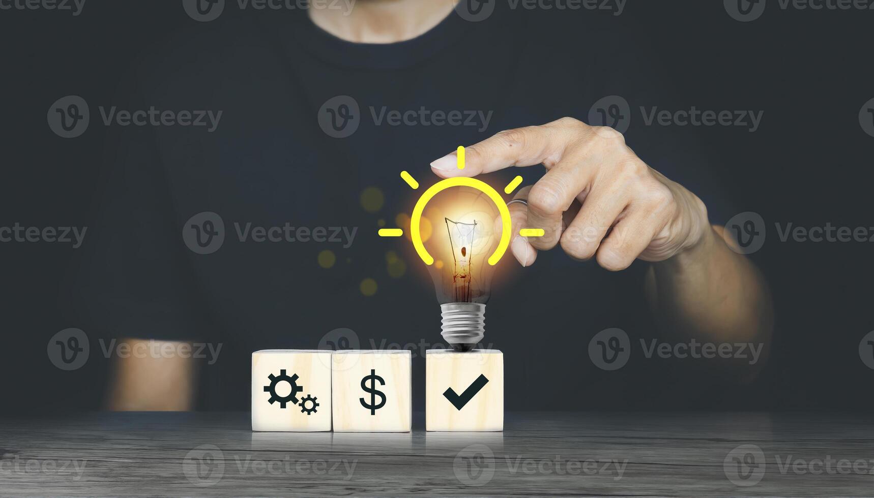 man choosing between two options with light bulb and dollar sign photo