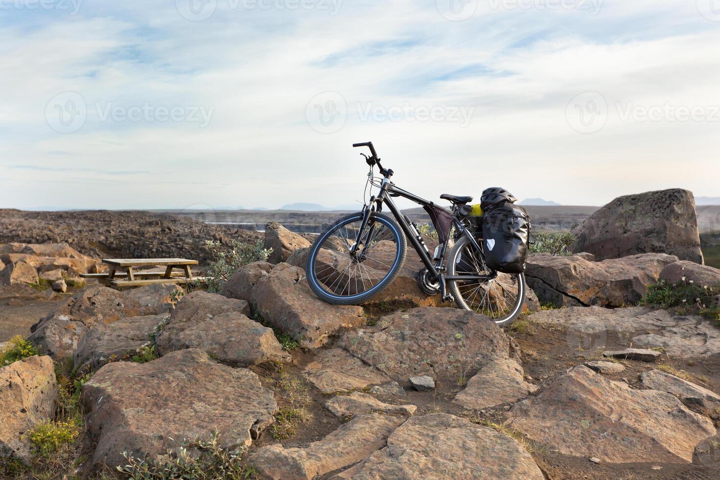 Bike with active equipment at Iceland mountains scene photo