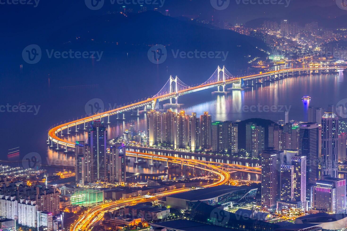 Busan city and skyscrapers in Haeundae district and Gwangan Bridge, Busan South Korea. photo