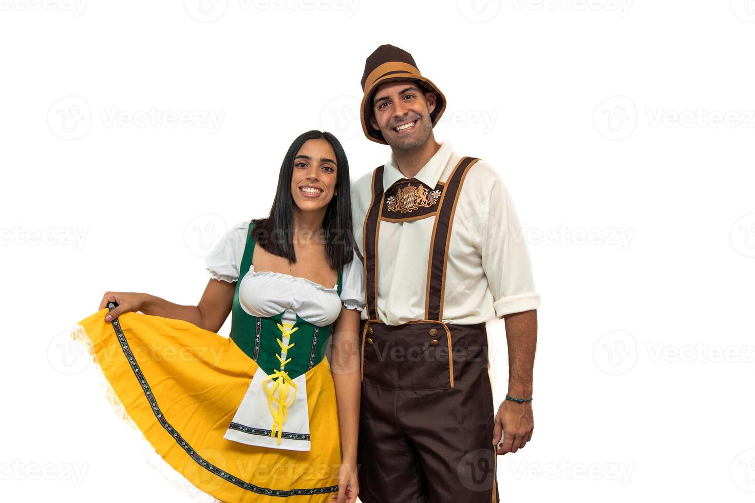 Bavarian couple in traditional clothing posing and smiling, ready for Oktoberfest white background photo