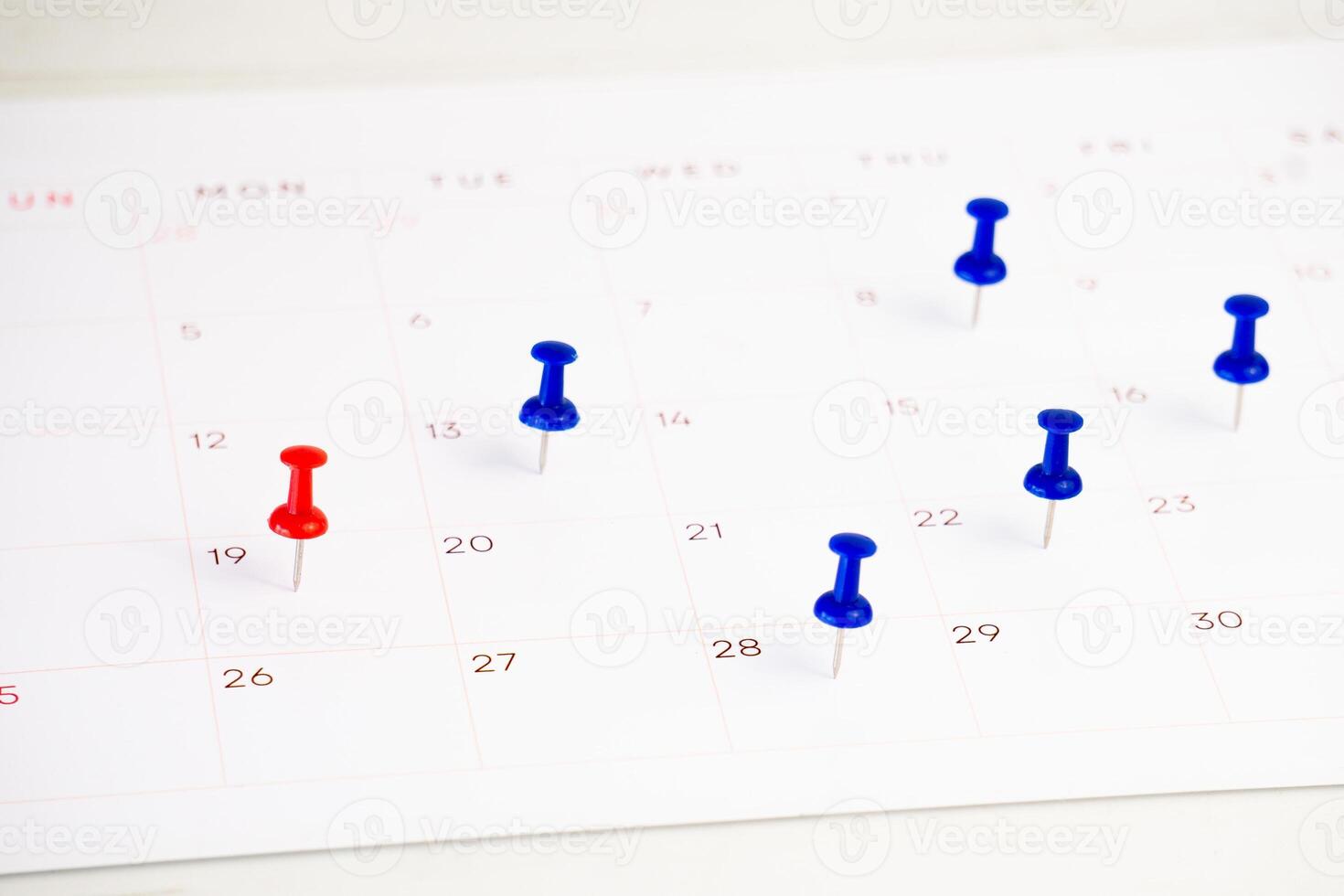 calendar sheet on table with pin photo