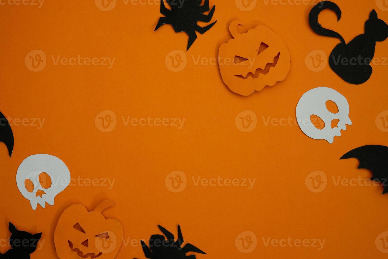 Cat and skull paper cut out for copy space backdrop photo