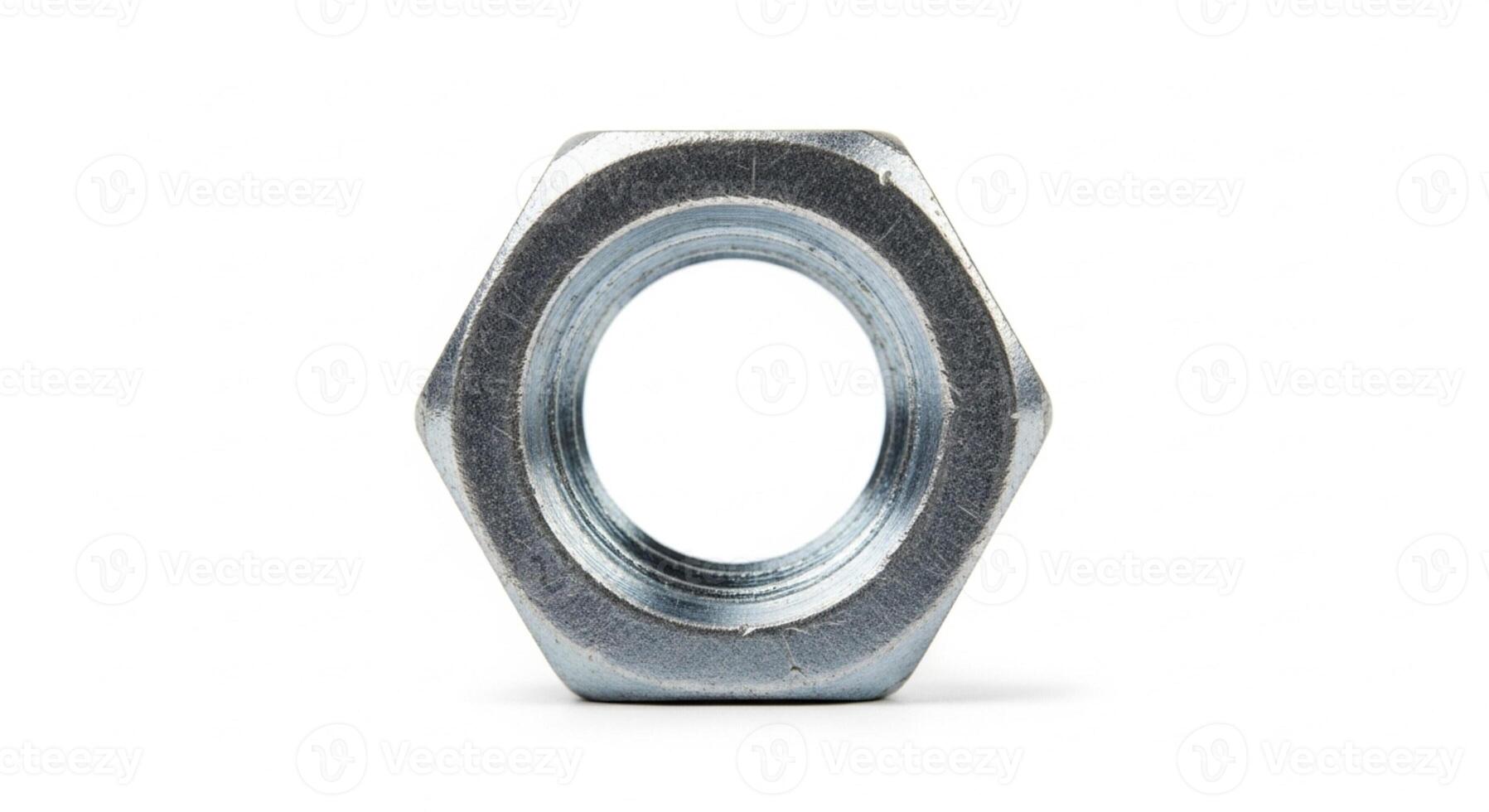 Closeup of A small metal nut isolated on white photo