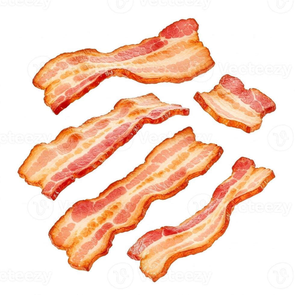 Floating bacon strips isolated on white photo