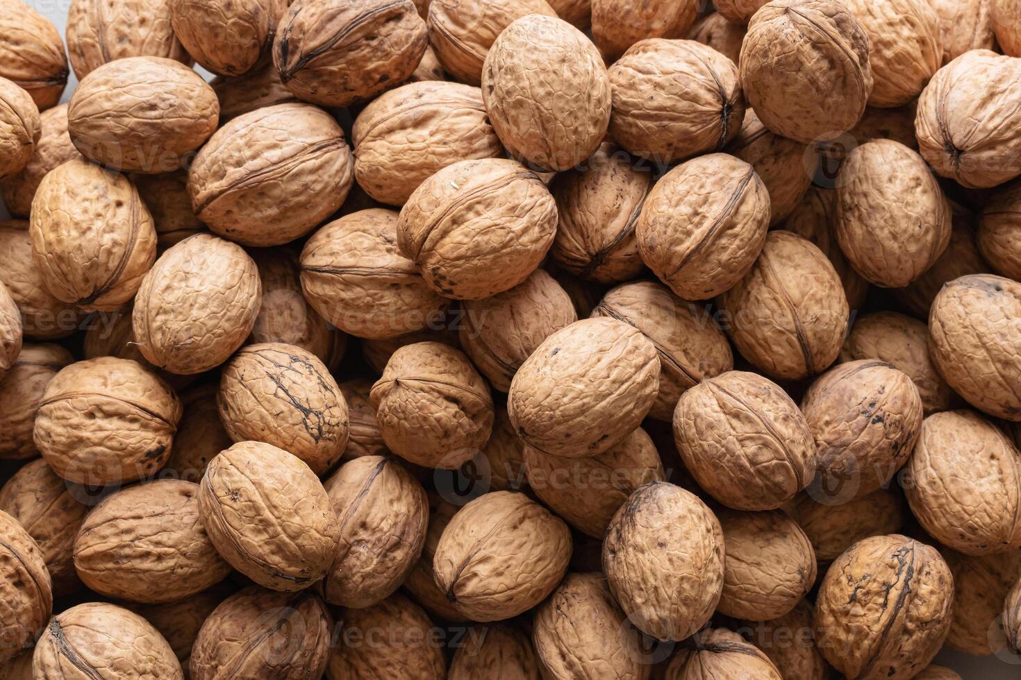 Walnut background. Walnuts in close-up. photo