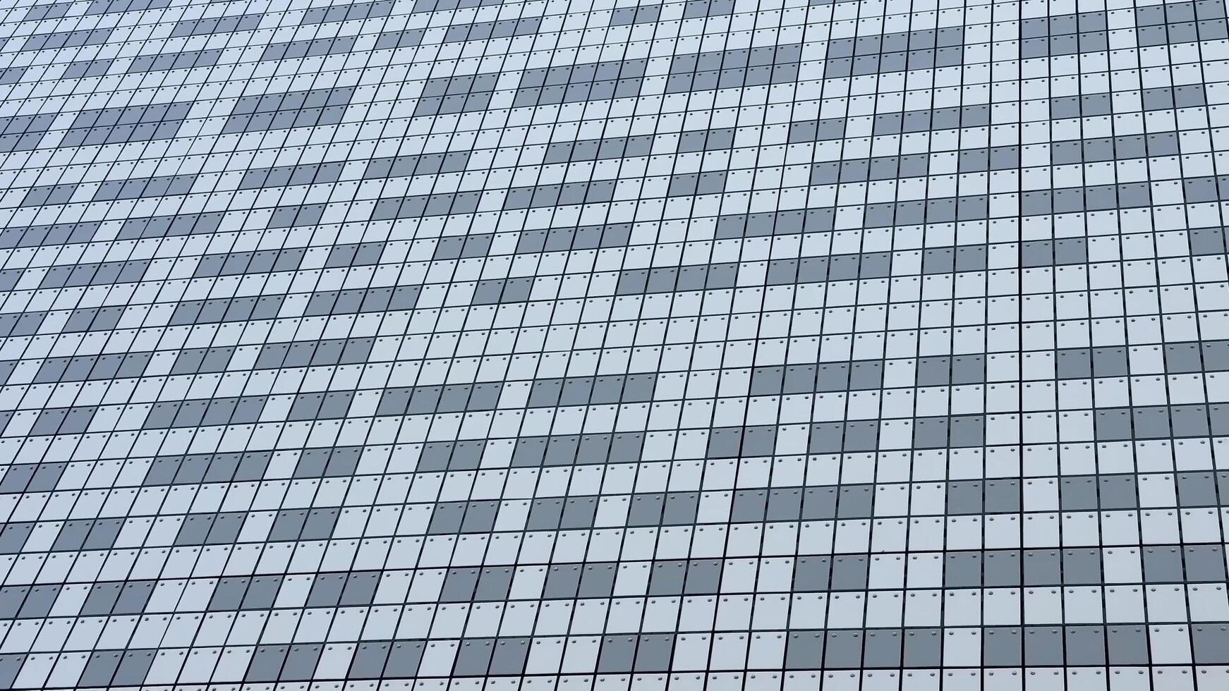 A Contemporary Architectural Facade Embellished with an Intricate Mosaic Pattern Design photo