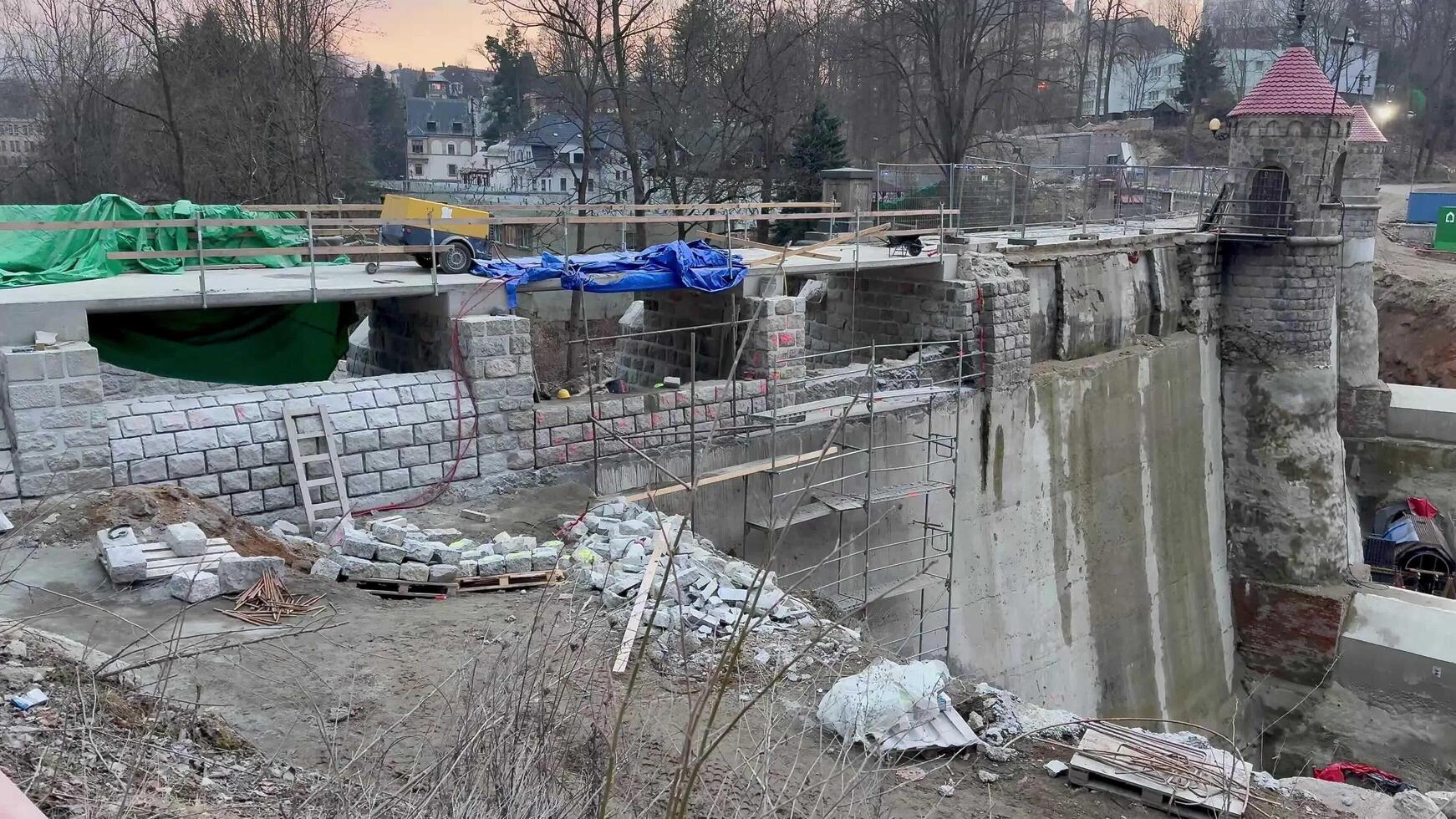 The ongoing construction progress on a project site during the beautiful time of dusk photo