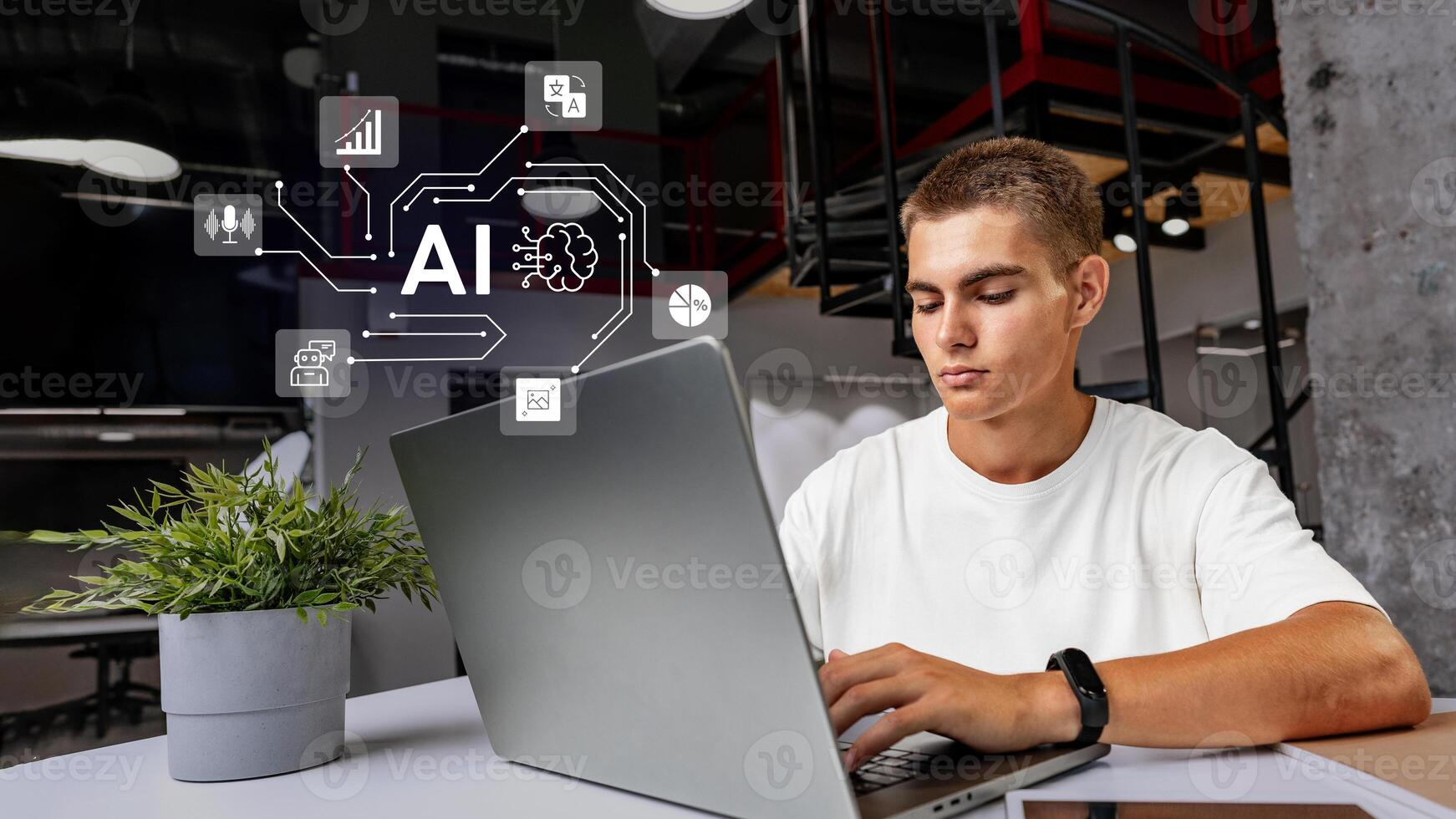 Young man engages in artificial intelligence project while working on a laptop in a modern office space during the day photo