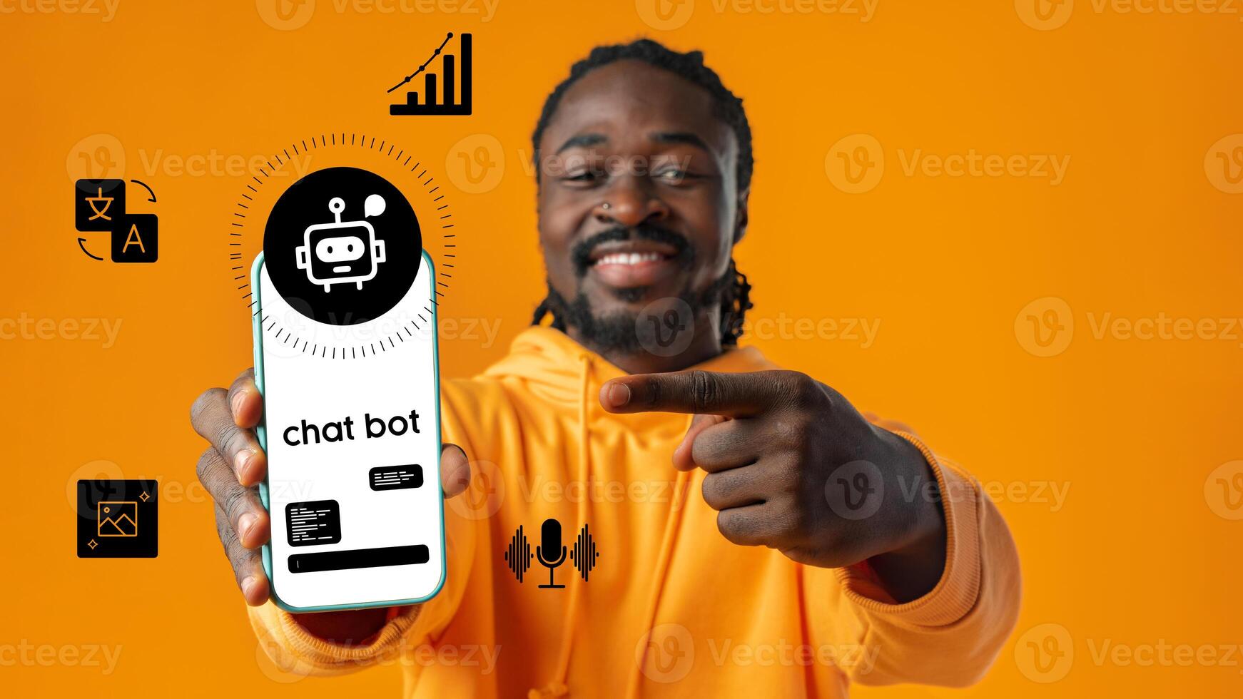 Man showcasing chatbot app on smartphone while standing against vibrant orange background photo