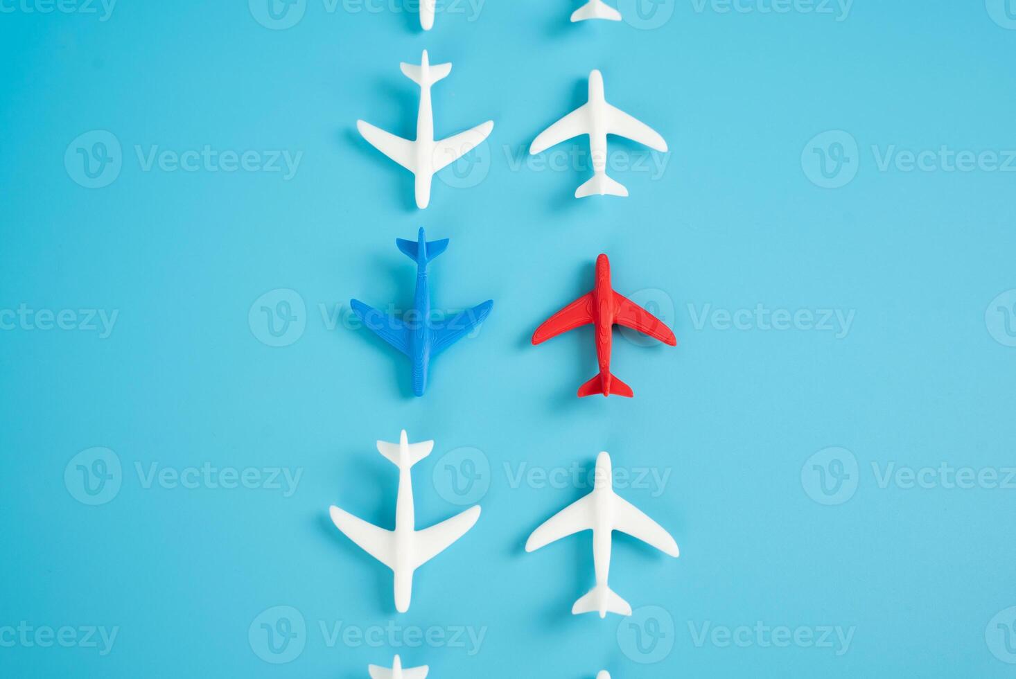 Two planes and two oppositely directed flows of aircraft. Competition in aerospace. Broader industry polarization. Competing airlines photo