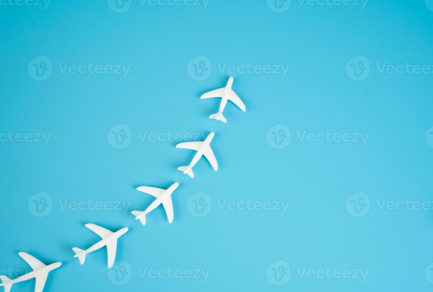 Planes fly in a chain. Opening of new tourist destinations. Seasonal flight planning, airline alliances, or interconnected tourism hubs. photo