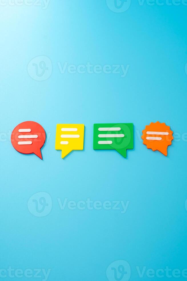 Conversational figures. Opinions and feedback. Dialogue, online comments, collaborative brainstorming, or public sentiment. Civic engagement, social media culture, or consumer feedback. photo