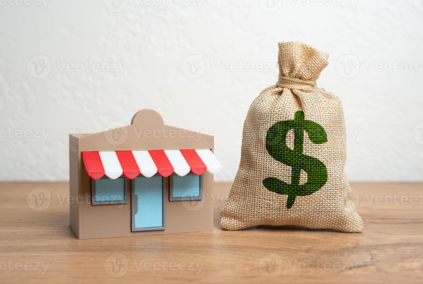 Shop and dollar money bag. Income and profit. Franchise revenue. Open your own business, borrow money. Retail profit, small business income, or the economic flow in local commerce. photo