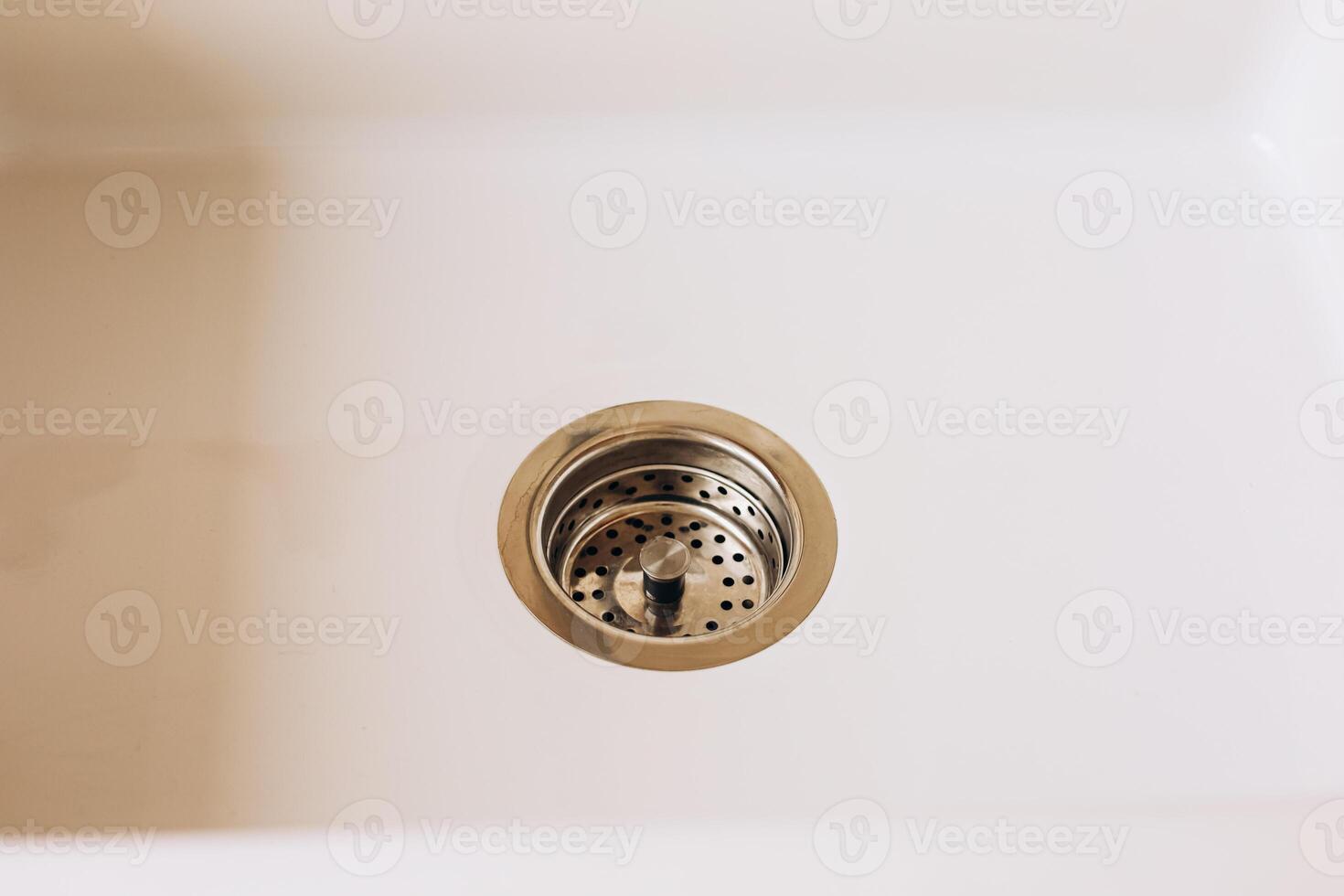 Drain in a modern kitchen sink captures everyday life and functionality in a bright space photo