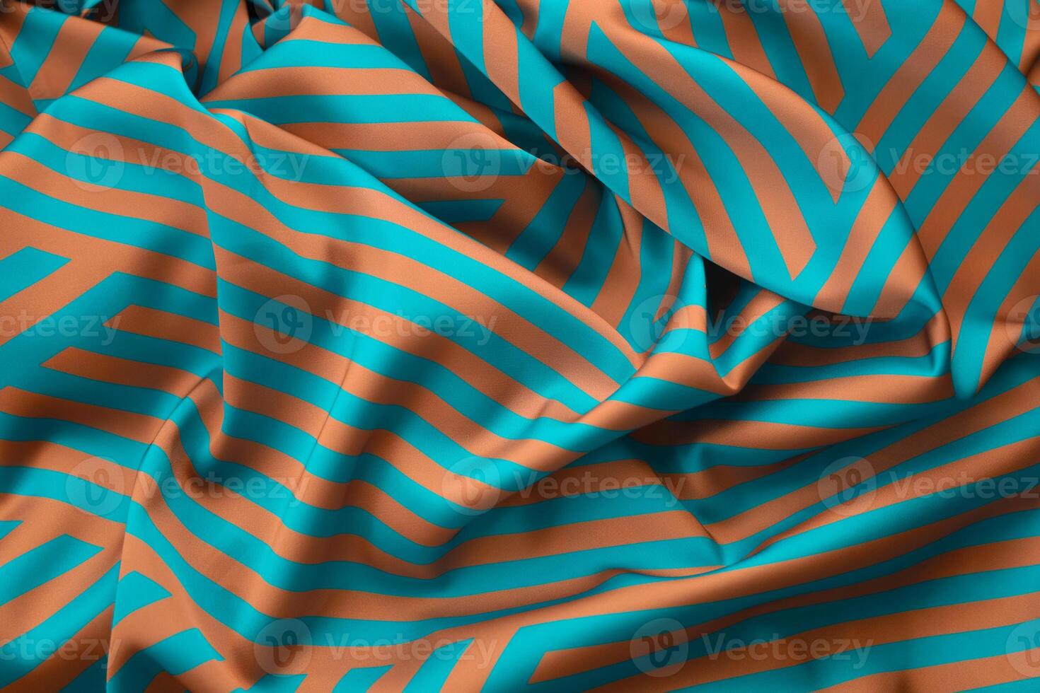 Colorful patterned fabric with blue and orange stripes in vibrant textures and folds photo
