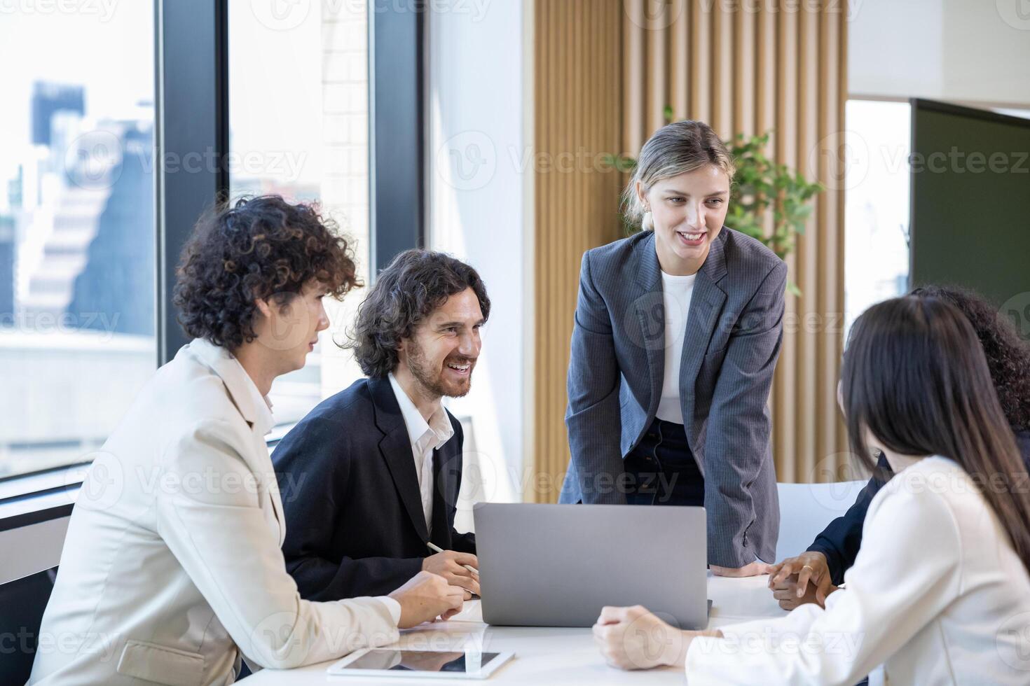 Caucasian businesswoman sale manager is showing annual report chart to her colleagues in executive meeting for next year plan with market share increase for global business and investment photo