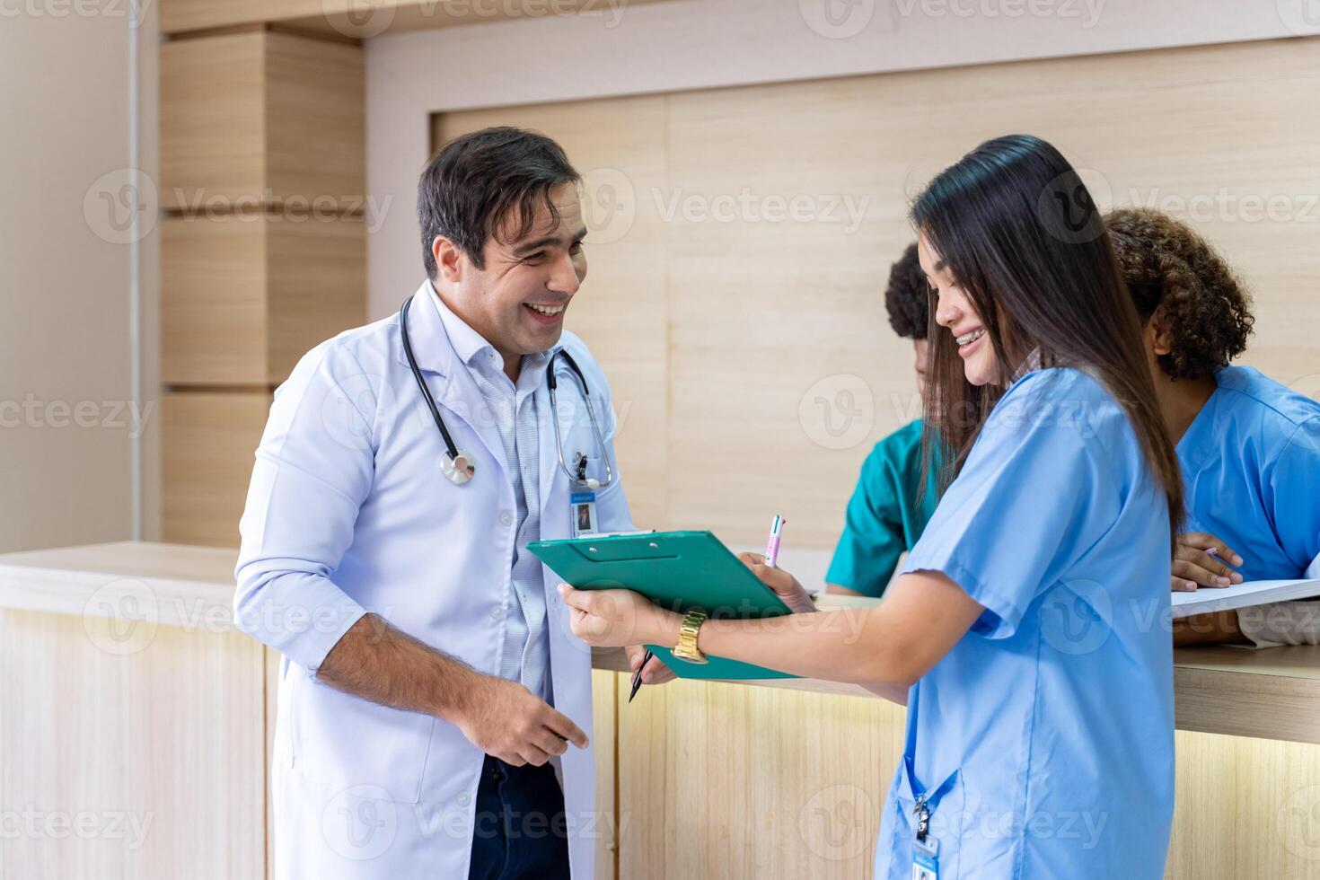 Team of doctor and nurse is discussing and brainstorming over patient medical record after diagnosis for precise care plan with experienced senior physician specialist photo