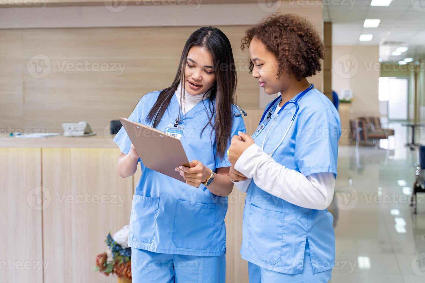Team of diversity doctor and nurse are discussing and brainstorming on patient medical record after diagnosis for precise care plan with experience physician specialist photo