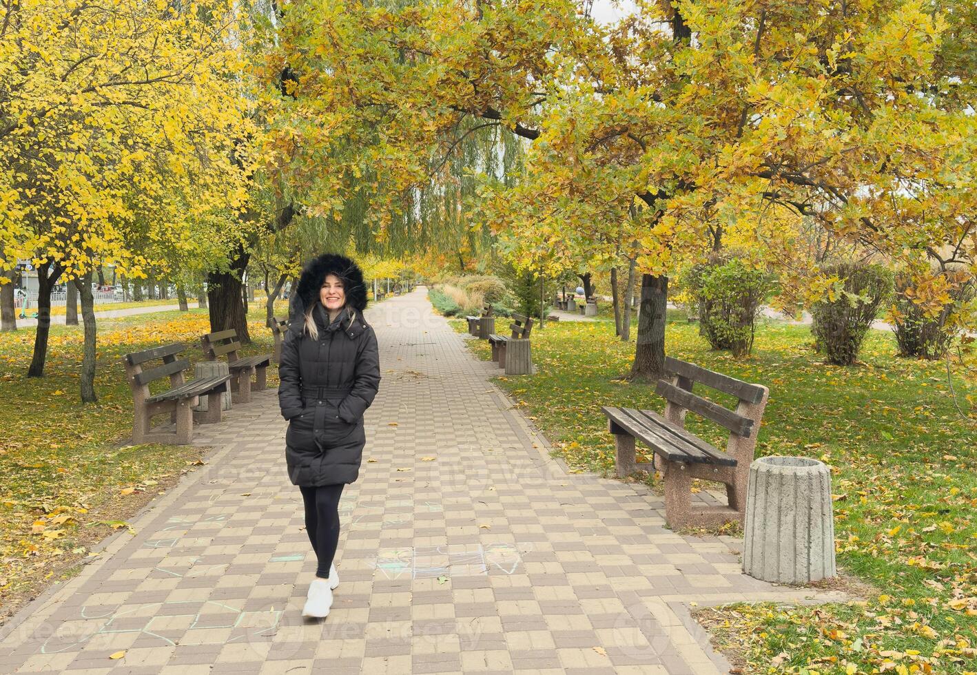 Lonely woman in autumn. mood and seasonal affective disorder concept. photo