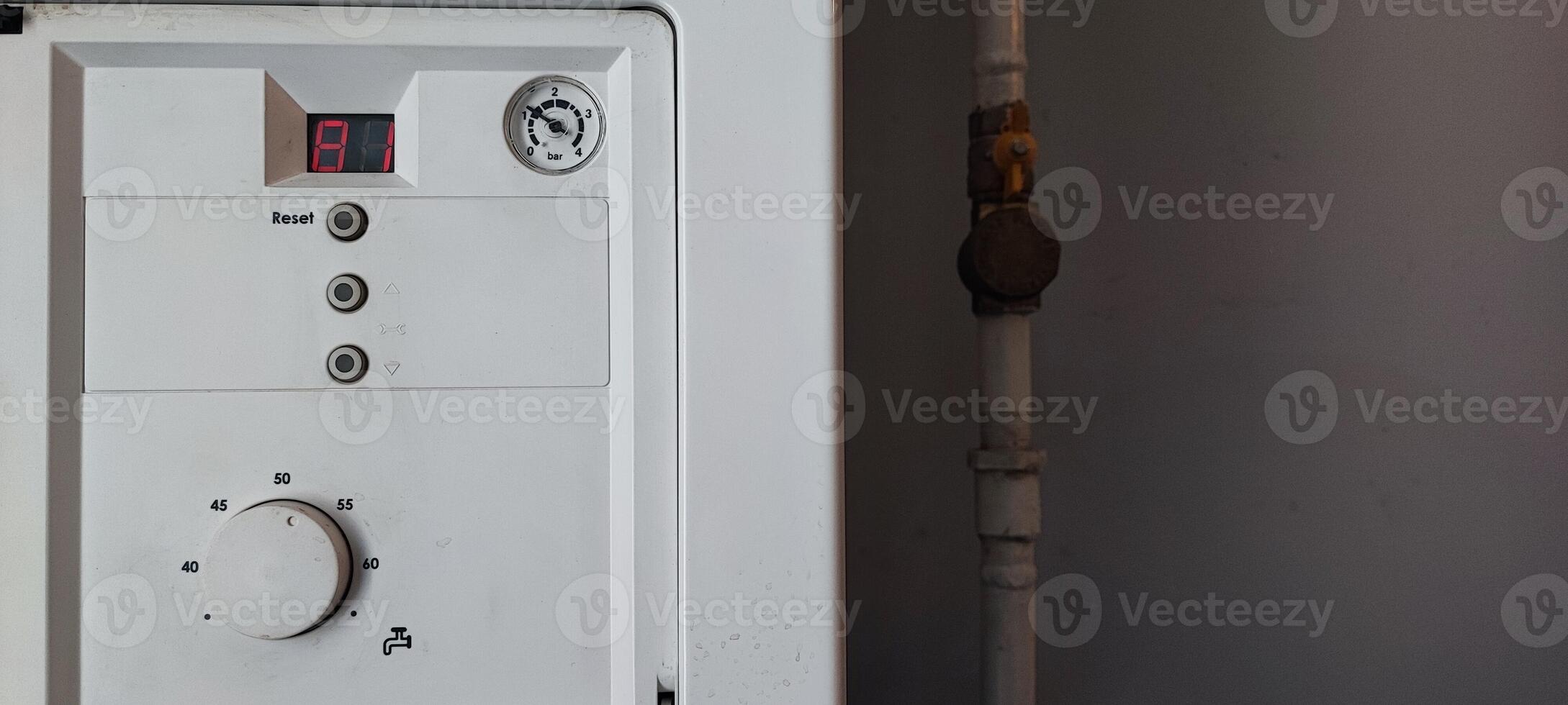 Gas Boiler a Control Panel with Error Code E1. Heating System Maintenance, Utility Technology, Home Appliance photo