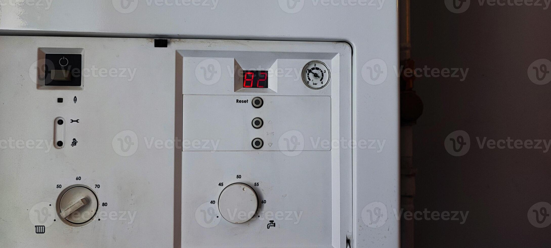 Gas Boiler Control Panel with a Error Code E1. Heating System Maintenance, Utility Technology, Home Appliance photo