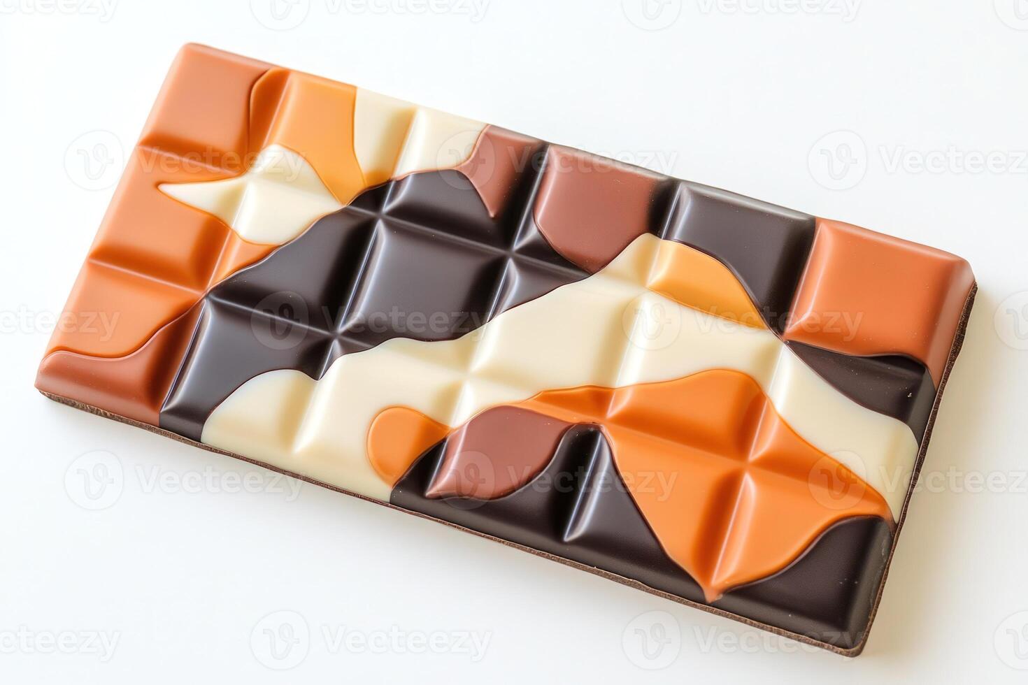 Segmented chocolate bar featuring marbled design of milk chocolate, dark and white chocolate photo